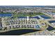 An aerial view of a Primary planned community with multiple ponds and manicured landscaping at 6232 Sea Air Dr, Apollo Beach, FL 33572