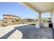 Large paver patio with a built-in outdoor kitchen, grill, and refrigerator at 6232 Sea Air Dr, Apollo Beach, FL 33572