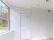 Bedroom has a window offering natural light and a closet for storage at 6699 78Th N Ave, Pinellas Park, FL 33781