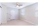 Bedroom featuring a window offering natural light and entrance to sun room at 6699 78Th N Ave, Pinellas Park, FL 33781