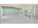 Spacious living room with unique architectural details and an aquarium, ready for personalized updates at 1575 Brookside Blvd, Largo, FL 33770
