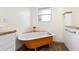 Vintage-style bathroom featuring a freestanding tub, updated fixtures, and classic design at 2201 Park N St, St Petersburg, FL 33710