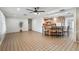 Open living room and kitchen area with tile flooring and natural light at 6327 2Nd S Ave, St Petersburg, FL 33707