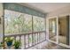 Screened lanai that overlooks a greenbelt, offering a private and peaceful retreat at 1250 S Pinellas Ave # 713, Tarpon Springs, FL 34689