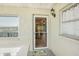 Inviting front entrance with a storm door and a 