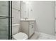 This features a stylish sink with a modern faucet and a spacious shower with glass door at 6123 Hidden Branch Dr, Apollo Beach, FL 33572