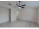 Spacious living room with tile flooring and a ceiling fan at 102 Shoreview Ln, Oldsmar, FL 34677