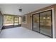 The screened patio showcases an entertainment area with an indoor outdoor experience overlooking the pool at 102 Shoreview Ln, Oldsmar, FL 34677