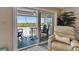Balcony offering comfortable seating and beautiful waterfront views and interior room at 18325 Gulf Blvd # 407, Redington Shores, FL 33708