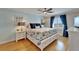 Relaxing bedroom with stylish furnishings, including blue curtains and coastal-themed decor at 18325 Gulf Blvd # 407, Redington Shores, FL 33708