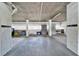 Spacious storage area featuring concrete floors, cinder block walls, and ample storage space at 18325 Gulf Blvd # 407, Redington Shores, FL 33708