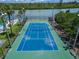 Aerial view of tennis court available to residents near the waterway at 18325 Gulf Blvd # 407, Redington Shores, FL 33708