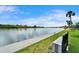 Water view from the property showing the lake and the community under a clear blue sky at 18325 Gulf Blvd # 407, Redington Shores, FL 33708