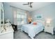 Cozy bedroom features a comfortable bed, soft lighting, and neutral decor at 20108 Sea Glass Cir, Land O Lakes, FL 34638