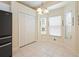 Cozy breakfast nook with large windows and a view of the backyard at 5215 New Brittany Ln, Zephyrhills, FL 33541