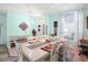 Inviting dining area with stylish decor and ample seating, perfect for entertaining guests in this home at 5215 New Brittany Ln, Zephyrhills, FL 33541