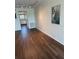 Open-concept living area with tile flooring leading to kitchen at 6020 Shore Blvd S # 109, Gulfport, FL 33707