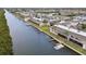 Community aerial view showing canal access, docks, well-kept landscaping, and community amenities at 8829 Bay Pointe Dr # 205, Tampa, FL 33615