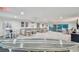 A large seating area and tables offer space to relax and visit with other residents at 8829 Bay Pointe Dr # 205, Tampa, FL 33615
