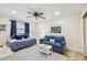 Inviting living room with a daybed and sofa, creating a relaxing space for guests or Gathering at 8829 Bay Pointe Dr # 205, Tampa, FL 33615