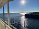 A scenic view from a balcony shows the bay waters on a sunny day at 8829 Bay Pointe Dr # 205, Tampa, FL 33615