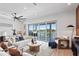 Bright living room with water views, comfortable seating, and modern design at 17059 Dolphin Dr, North Redington Beach, FL 33708
