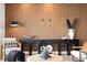 Living area showcasing a statement wood paneled wall and modern decor at 17059 Dolphin Dr, North Redington Beach, FL 33708