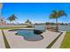 Luxury waterfront property with a custom pool, spa, and private dock at 17059 Dolphin Dr, North Redington Beach, FL 33708