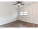 Cozy bedroom features wood-look floors, ceiling fan, and natural light at 3721 9Th S Ave, St Petersburg, FL 33711