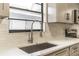 Bright kitchen features stainless steel appliances, white quartz countertops, and new fixtures at 3721 9Th S Ave, St Petersburg, FL 33711