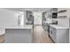 Spacious kitchen features an island, stainless appliances, and ample cabinet space at 3721 9Th S Ave, St Petersburg, FL 33711