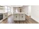Open floorplan view of a kitchen island in a home featuring new flooring at 3721 9Th S Ave, St Petersburg, FL 33711