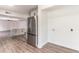 Open kitchen features stainless steel appliances, and a large stainless refrigerator at 3721 9Th S Ave, St Petersburg, FL 33711
