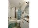Well-maintained bathroom featuring a shower and tub, a modern vanity, and updated fixtures at 4684 25Th S Ave, St Petersburg, FL 33711
