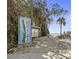 Convenient beach access with a welcome sign showing a map of Sunset Beach at 8750 Harrell Ave, Treasure Island, FL 33706