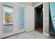 Modern elevator accessible from the foyer, with seamless access to the pool area via glass doors at 8750 Harrell Ave, Treasure Island, FL 33706