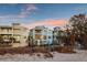 Beautiful beachside property with charming balconies and ocean views from the sandy beach at 8750 Harrell Ave, Treasure Island, FL 33706