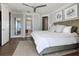 This main bedroom has hardwood floors and three points of entry into other rooms in the home at 8750 Harrell Ave, Treasure Island, FL 33706
