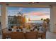 Covered patio area overlooking the beach at sunset; a great space for outdoor dining and entertaining at 8750 Harrell Ave, Treasure Island, FL 33706
