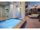 Inviting outdoor oasis with a pool, spa, and lounge chairs perfect for relaxation in a private setting at 8750 Harrell Ave, Treasure Island, FL 33706
