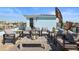 Relaxing rooftop deck with cozy seating areas and panoramic city and water views at 8750 Harrell Ave, Treasure Island, FL 33706
