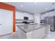 Modern kitchen with granite countertops, stainless steel appliances, and white cabinetry at 16719 Delia St, Wimauma, FL 33598