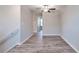 Open loft space with wood-look flooring at 16719 Delia St, Wimauma, FL 33598