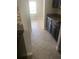Cozy eat in kitchen featuring stylish cabinets, neutral paint and ceramic tile floor at 2588 Bartolo Dr, Land O Lakes, FL 34639