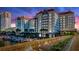 Stunning waterfront condo building with a marina, lush landscaping, and gorgeous architecture at 700 S Harbour Island Blvd # 226, Tampa, FL 33602