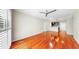 Bright living room with hardwood floors, ceiling fan, and view to a kitchen at 700 S Harbour Island Blvd # 226, Tampa, FL 33602
