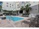 Relaxing pool area with lounge chairs surrounded by lush tropical landscaping and building views at 700 S Harbour Island Blvd # 226, Tampa, FL 33602