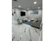 Living room features modern furnishings, a television, and bright, clean decor at 6220 Westport Dr, Port Richey, FL 34668