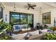 Beautiful outdoor patio with comfortable seating and elegant decor at 7876 Marsh Pointe Dr, Tampa, FL 33635