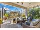 Relaxing screened-in patio with comfortable seating and beautiful outdoor views at 7876 Marsh Pointe Dr, Tampa, FL 33635